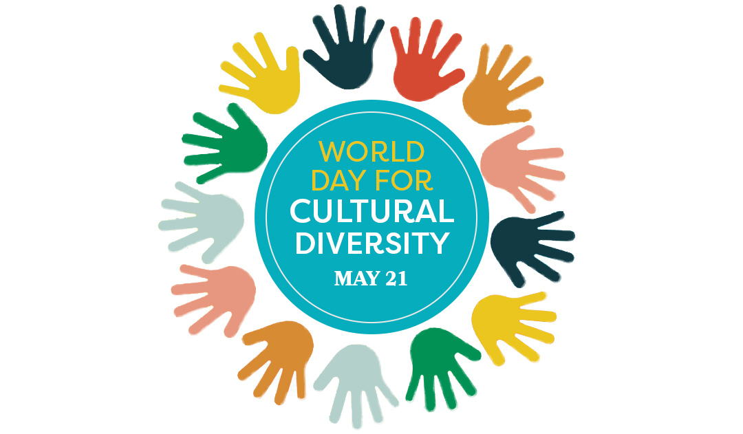 Colourful hands arranged in a circle around the words "World Day for Cultural Diversity, 21 May."